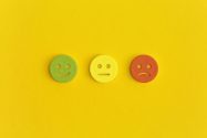 Emoticons illustrating a commitment to quality